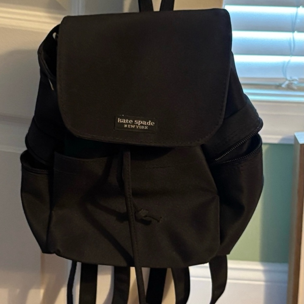 Mini Kate spade black backpack, like new, not sure if authentic hence price